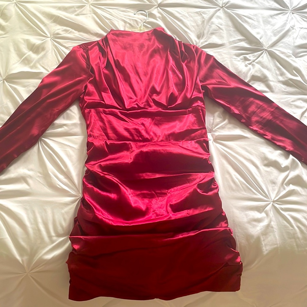 Silk material knee length dress only worn once.